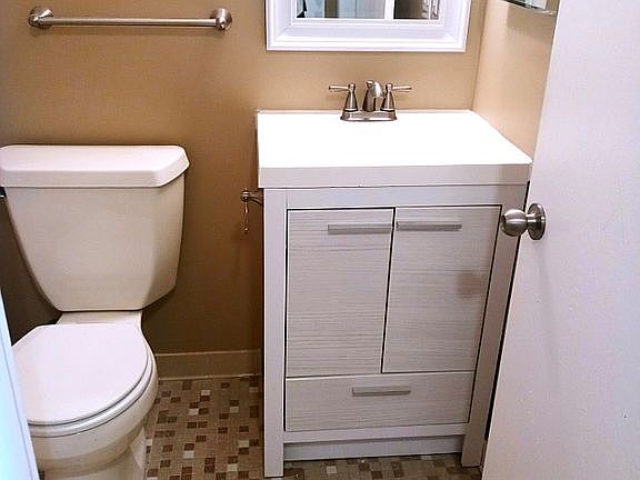 Main bath new sink. Toilet vanity