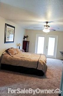 Spacious Master Bedroom w/new Carpet
						:
						Master Bedroom also has his/hers Vanity and Closets; Tub, large Shower and more.