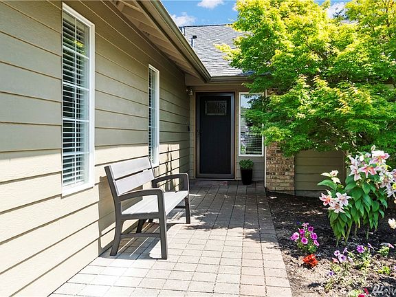 Beautiful walkway leads to the front entry. 