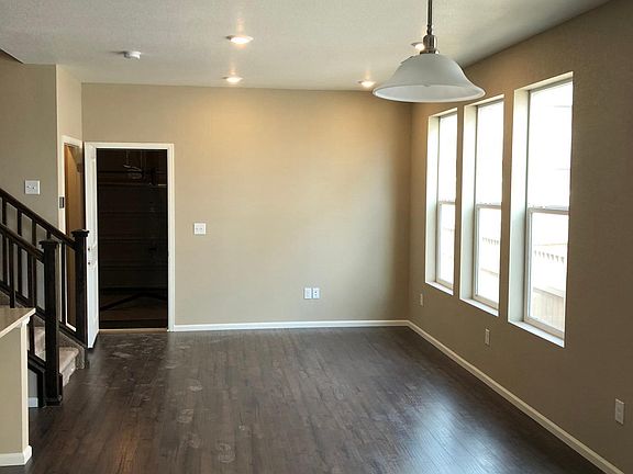 Open concept kitchen, dining, family room with lots of natur