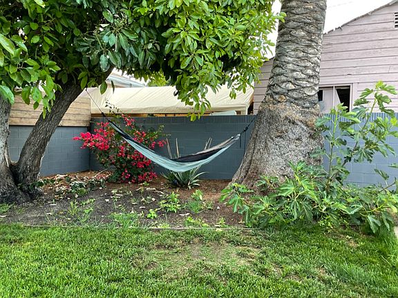 Cozy hammock. During the summer time in the evening a nice breeze comes in from the beach. It feels great to relax in the backyard.