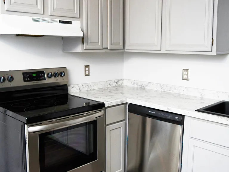 Kitchen view with appliances