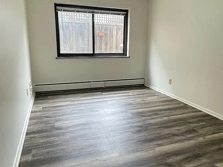 Step into the modern elegance of LS Capital Group. This spacious and well-lit living area features sleek flooring and large windows, perfect for creating your ideal retreat. Don't miss out on the comfort and stylea"schedule a viewing today!