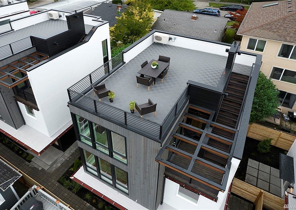 Modern exterior with rooftop deck over look at the beautiful skyline view