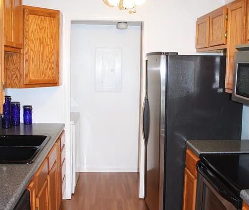 New Cabinets, Flooring, Countertops, and All Stainless Appliances Stay! 