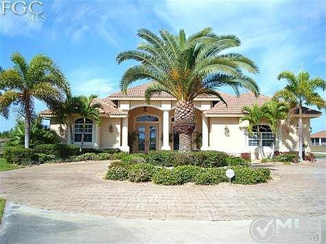 Custom Aranda Home on 2 cleared level acres~ side load 2 car attached garage ~ Detached 3 car shop less than 2 Miles from Burnt Store Marina and the best Snook, Tarpon, Red Fish and Trout fishing anywhere in SW Florida. Plus, Wet and Dry Indoor Storage, Boat Slips, Championship Public Golf, Tennis, 4 Star Restaurants and a variety of shops, bars and SW Florida fun in the Sun. You can't beat the location!