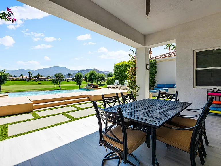 The covered patio is perfect for sunny days when you just need some shade.