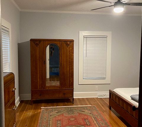 Main bedroom, freshly painted walls and refinished hardwood floors