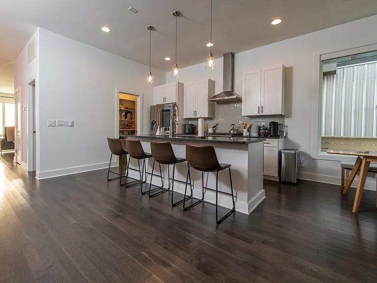 Kitchen Area and Island w/ Pantry