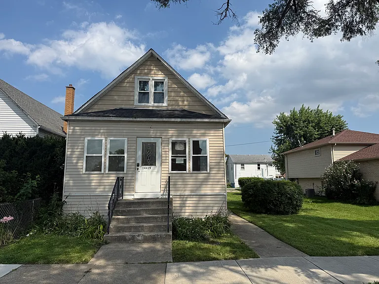 Front of house. Double lot with full yard.
