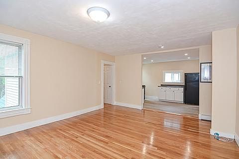 Huge Living room with hardwood flooring