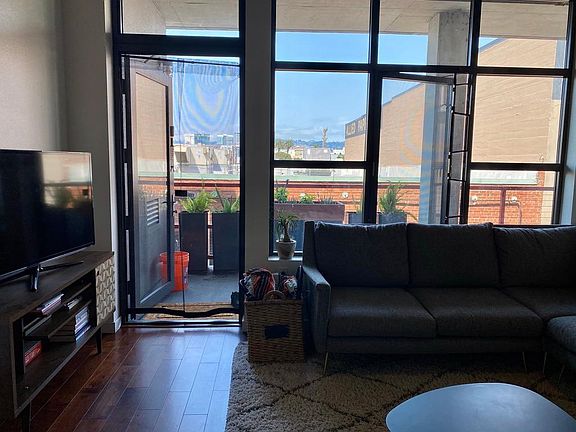 Doorway to private patio. Private patio spans the length of the living room and master bedroom.