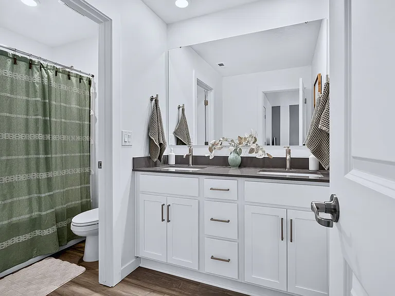 Upstairs Bathroom with Double Vanity & Private Shower Room