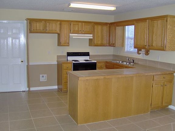 Fabulous, huge kitchen with tons of cabinets and large pantry.