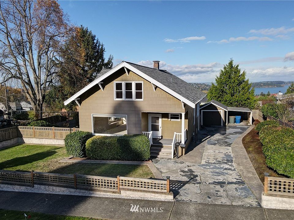 Welcome to 5718 S Prentice St, an Upper Rainier Beach Craftsman with views of Lake Washington and the Olympic Mountains!