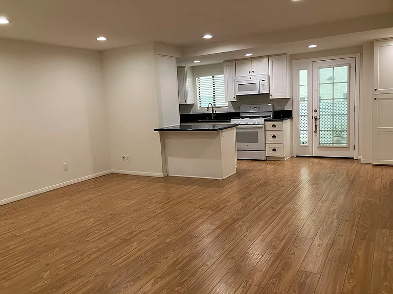 One side of kitchen and French door. Pantry is on the other side of the French door.