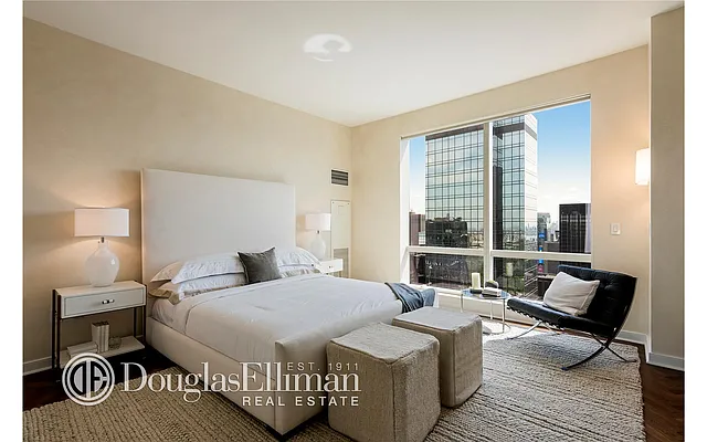 Sold by Douglas Elliman | media 12