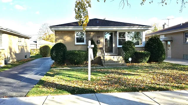 4929 N Ozanam Ave photo 1