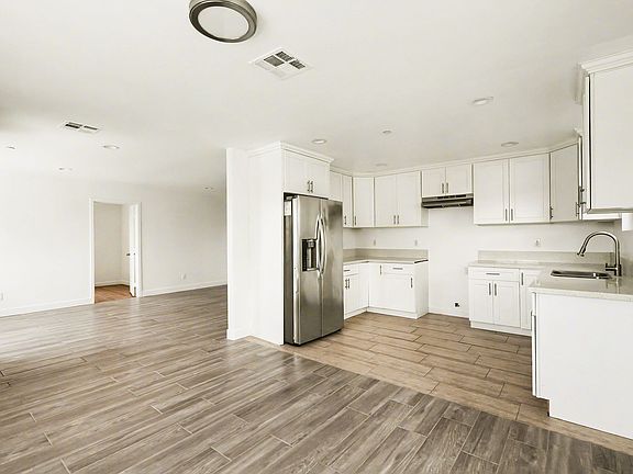 5th image of 8909 S San Pedro St