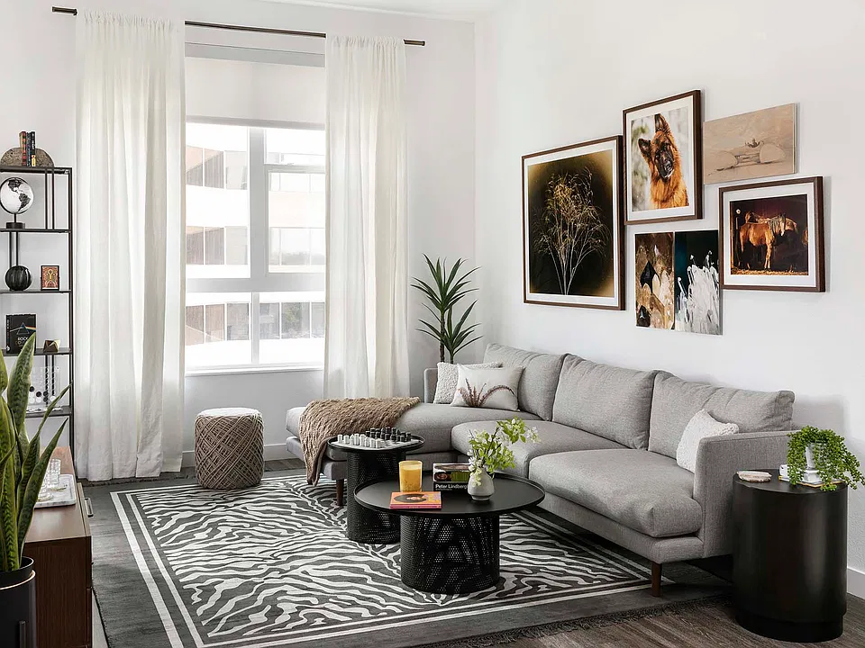 Griffis Cherry Creek North apartment living room with wood style floor.