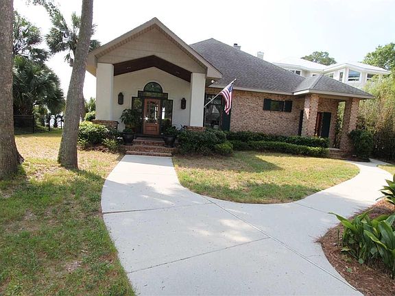 Showing portion of the driveway and entrance walks
