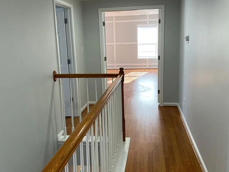 As you continue down the hall you will pass another bedroom w/ bath on the left on the way to the master bedroom straight ahead.
