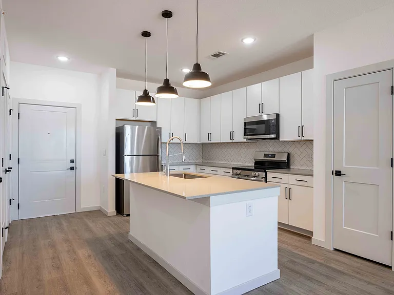 Kitchen with island seating in the Garrett Parker A1 floor plan