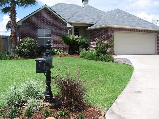 Beautifully landscaped front of home