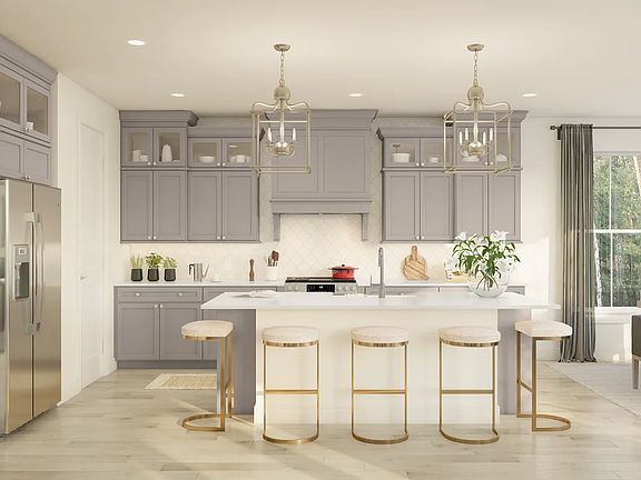 Kitchen with island, pendant lighting and glass-front upper cabinets