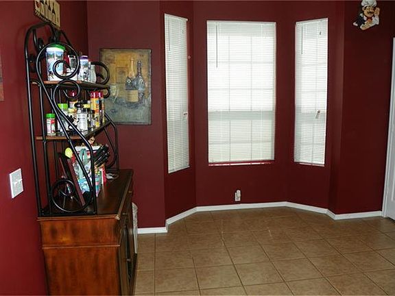 The breakfast room has a great bay window.