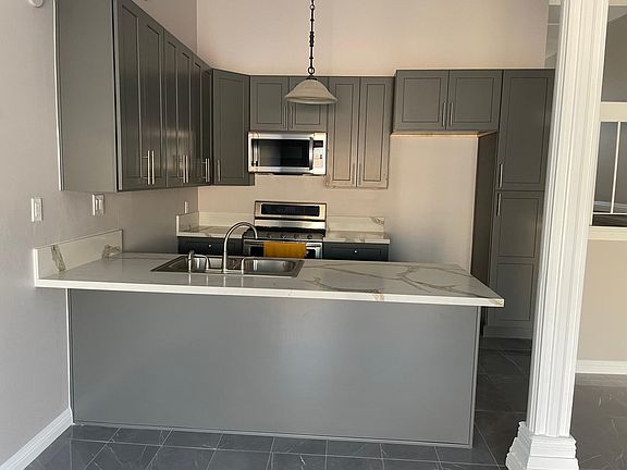 3rd image of 7924 Woodman Ave Unit 32