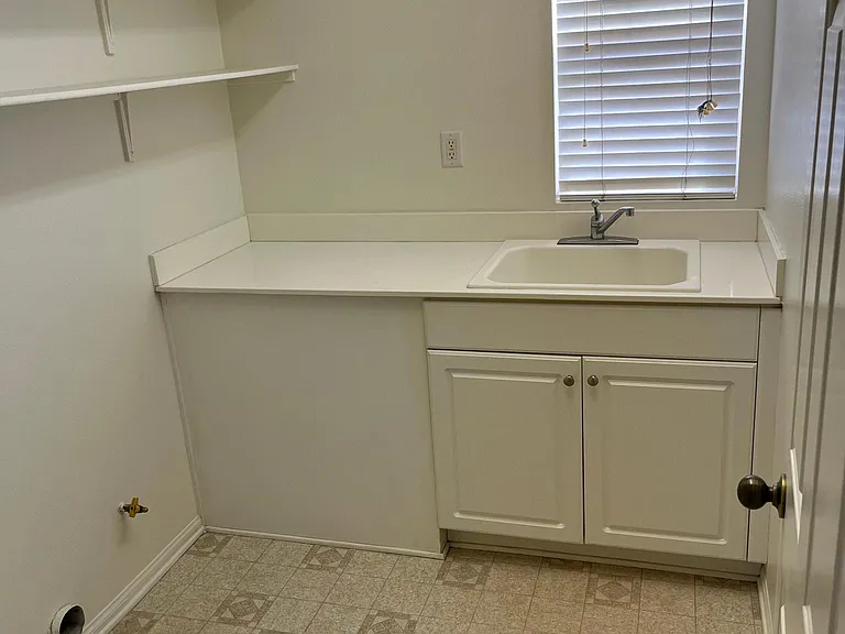 Laundry with room sink