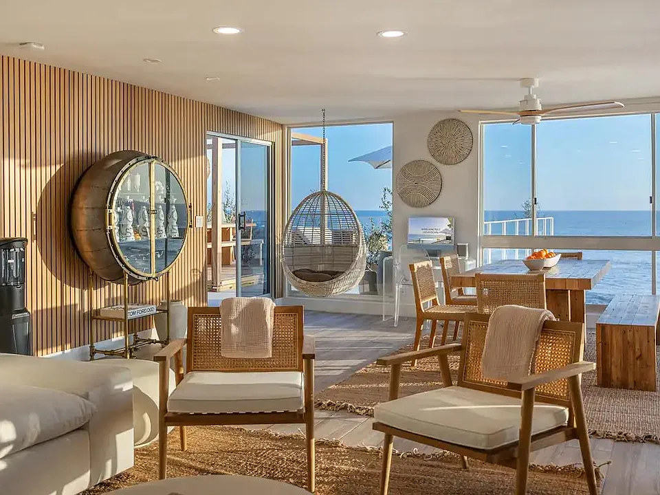 Timeless tranquility in the living room, where ocean views captivate at Aqualina.
