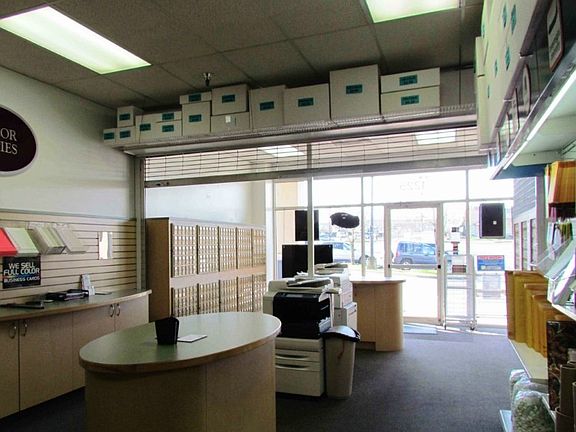 The gate behind the mailboxes locks up at night so customers can have access to their mailboxes anytime.