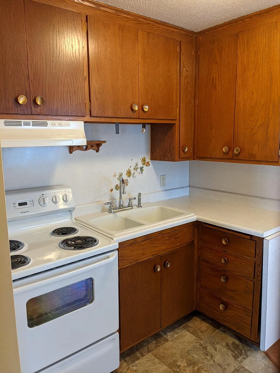 Kitchen has updated countertops - 1916 44th Ave N #2