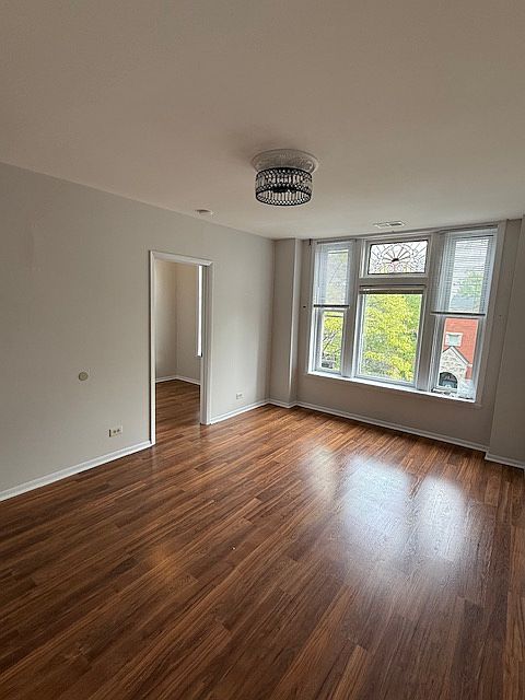 Family room door to the smaller bedroom
