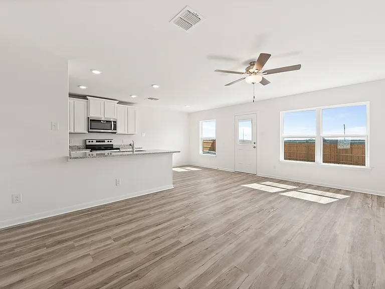 Vinyl flooring throughout the main living areas.