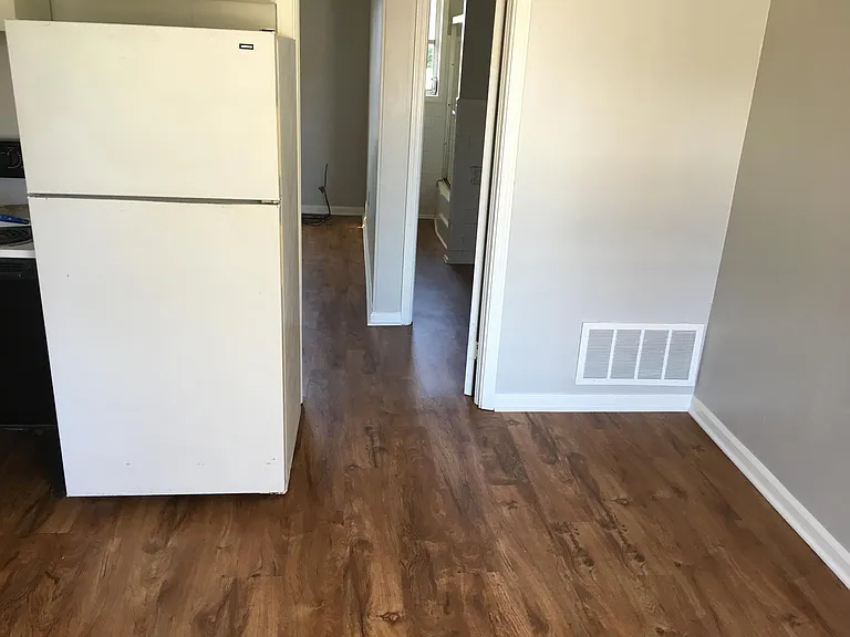 Living Area Leading into Bedroom and Bathroom