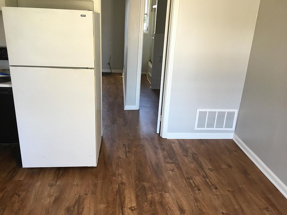 Living Area Leading into Bedroom and Bathroom