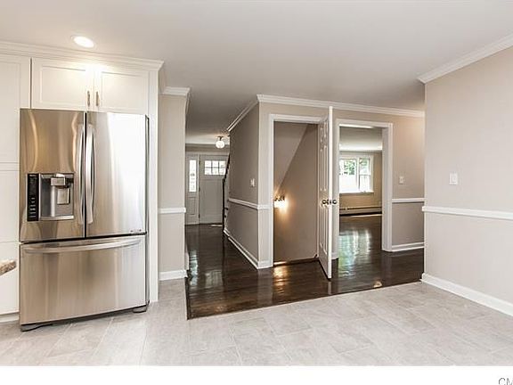 Front entrance with Center Hall Staircase