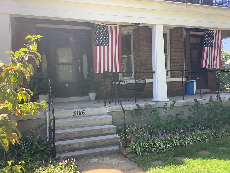 Front of building showing entire porch