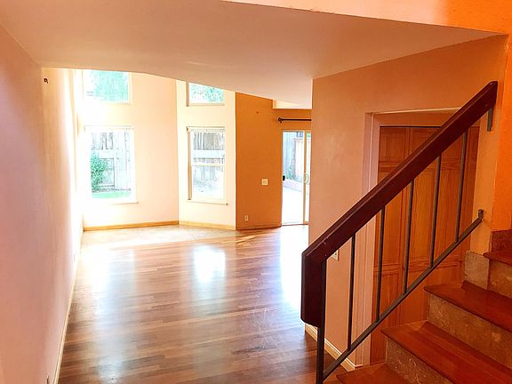 Open wood floor plan, good-sized window, natural daylight