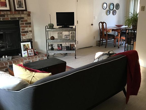Living room showing door to private garage.