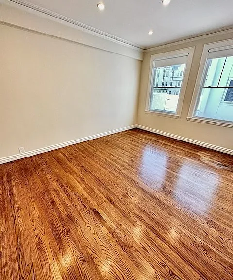 Unit #504 MASSIVE 2nd Bedroom with hardwood floors and recessed can lighting!