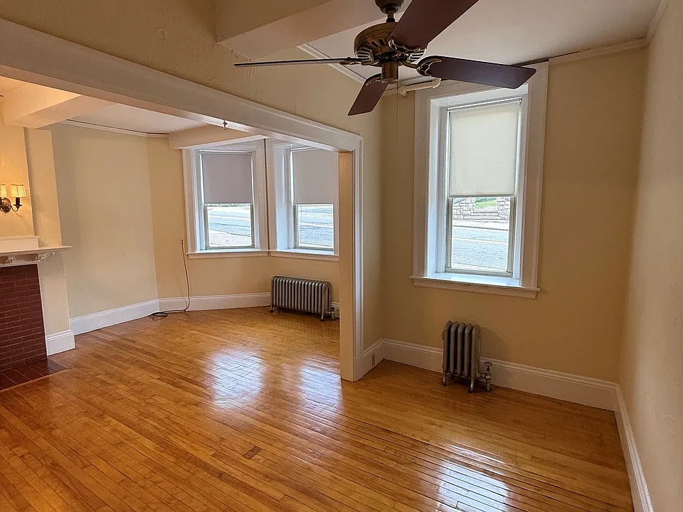 Ceiling fan in the area where most would assemble their bedroom.
