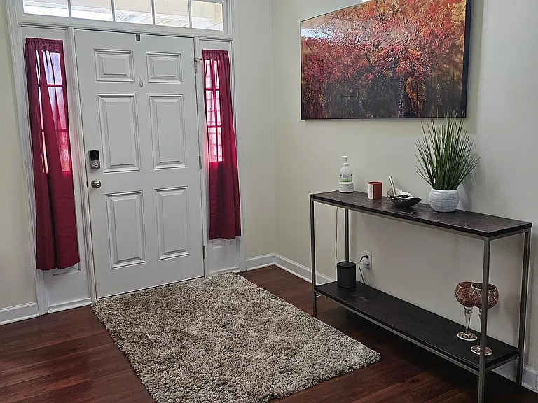 Front entryway, high ceilings.