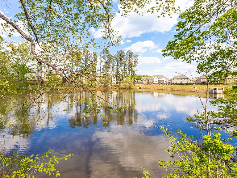 Natural small lake shared by the property backyard. Right behind the property. Exceptional views during summer and fall.