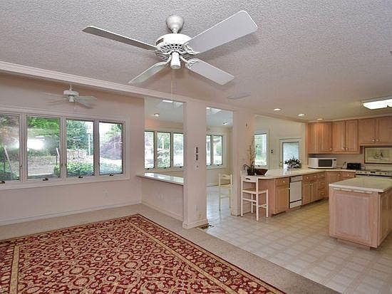 Beautiful open floor plan with living room, kitchen and sun porch