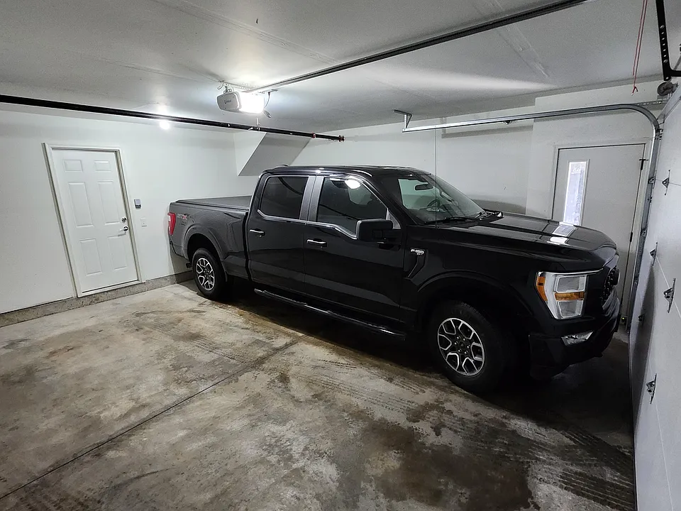 2 car attached garage included with 2 bedroom units. 20''-8" deep
