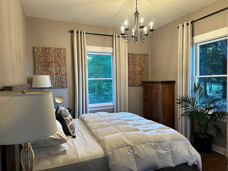 Bedroom 1: Cal King bed, 2 windows